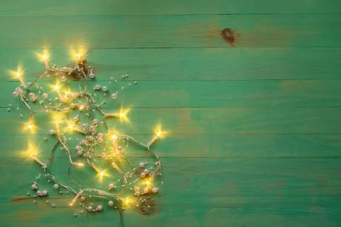 Christmas rustic background with lights and copy space Stock Photos