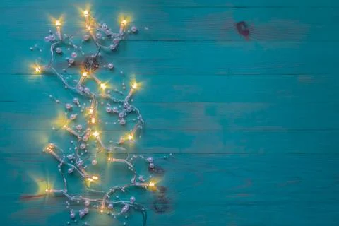 Christmas rustic background with lights and free space for text Stock Photos