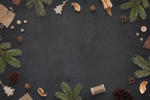Christmas rustic composition on dark surface. Top view, flat lay with copy sp Stock Photos