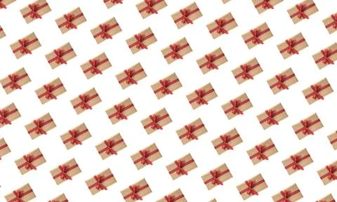 Christmas seamless pattern . Giftbox wrapped in craft paper with red ribbon i Stock Photos