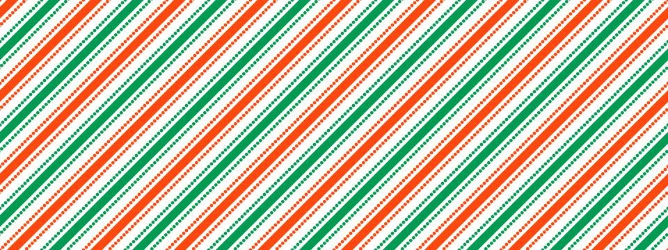 Christmas seamless pattern. Red and green diagonal straight dotted stripe Stock Illustration
