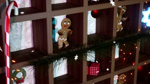 Christmas shelf with decorations. Ginger bread, decorations, lights and snow Stock Footage 256167784