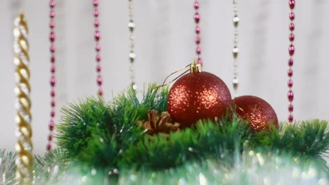 Christmas shiny toys rotate. Red balls rotate with a change of focus. Stock Footage