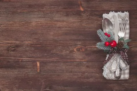 Christmas silver table set. Old wooden background. Stock Photos