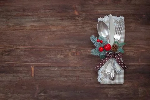 Christmas silver table set. Old wooden background. Stock Photos