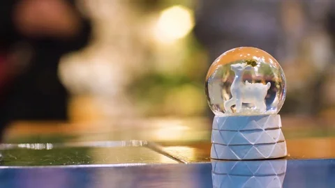 Christmas small snow globe is on the table, сopyspace Stock Footage 81800653