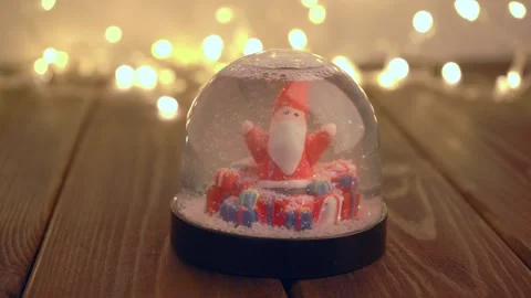 Christmas snow globe on bokeh background Stock Footage 283437860