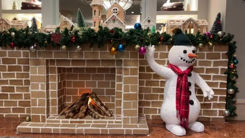 Christmas snowman chimney with pit fire and mistletoe twinkle lights Vidéo 294935170