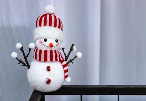 Christmas snowman on white background. Christmas holiday toy, home decor. Stock Photos