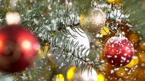 Closeup of Christmas tree branches with snowflakes - a Royalty