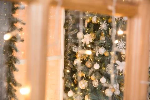 Christmas spruce through the door frame Stock Photos