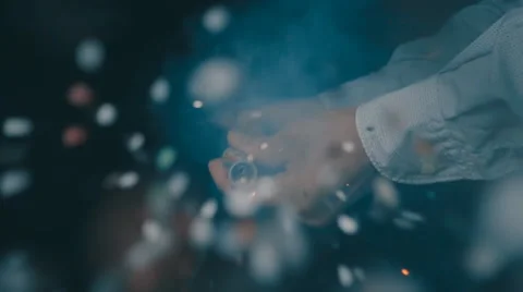 Christmas squib explodes and confetti flies straight into the camera. Slow mo Stock Footage 64716673