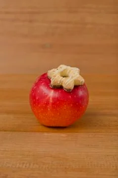 "Christmas Star" on the apple. Stock Photos