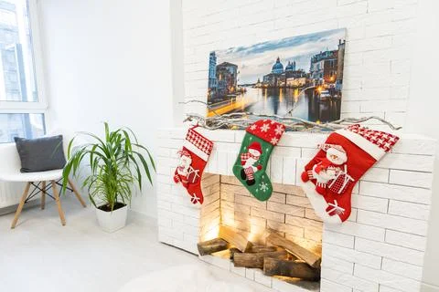 Christmas stocking on fireplace background. Stock Photos