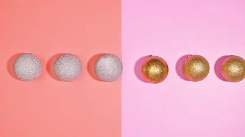 Christmas Stop Motion Flat Lay, Silver Ornaments Transform into Golden color Video stock 256112010