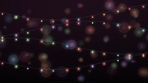 Christmas String Lights Hanging with Glowing Bokeh Background Video stock 347653509