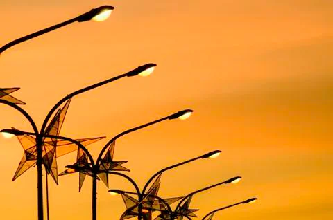 Christmas sunset electric posts Stock Photos