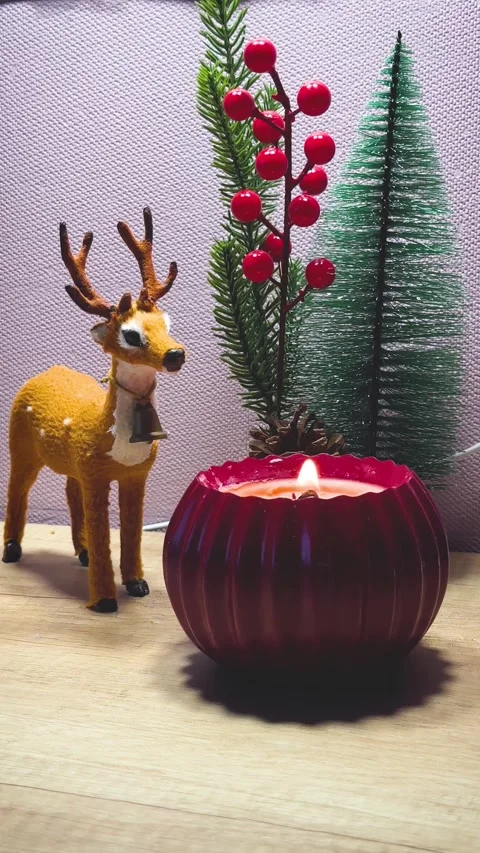 Christmas Table Decor with Candle Ball, Deer and Tree Stock Footage 321348189
