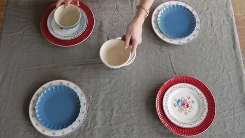 Christmas table decoration. festive table setting. Female hands decorate the Stock Footage 122685158