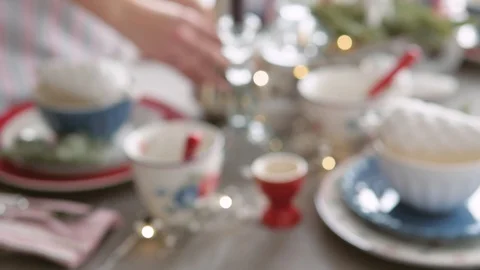 Christmas table decoration. festive table setting. Female hands decorate the 動画素材 123342789