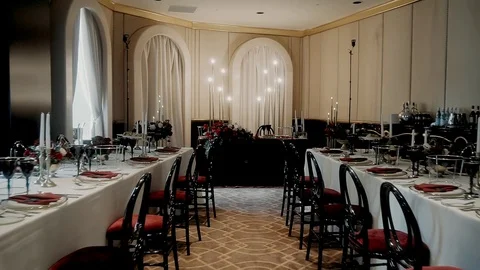 Christmas table with large candelabra decorated in red Stock Footage 121883507