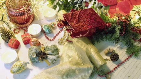 Christmas table with a lot of ornaments on it and present, steadycam shot Stock Footage 99223891