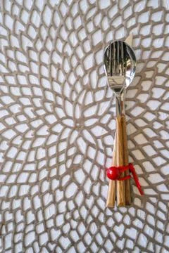 Christmas Table Place Setting with Silverware red berry ribbon decoration mod Stock Photos