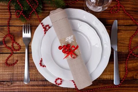 Christmas table setting on brown old wooden table Stock Photos