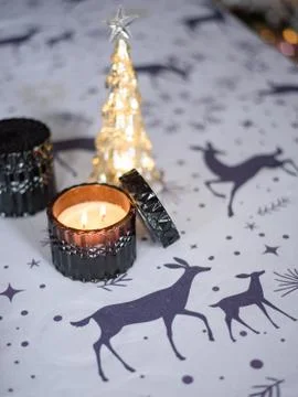 Christmas table setting with candles and decorations Stock Photos