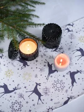 Christmas table setting with candles and decorations Stock Photos