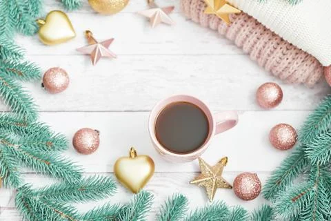 Christmas table setting. Cup of coffee or tea on background of Christmas tree Stock Photos
