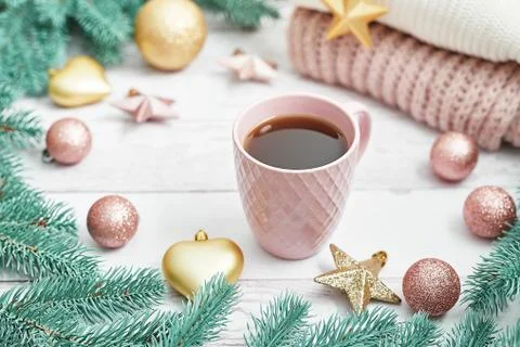 Christmas table setting. Cup of coffee or tea on background of Christmas tree Stock Photos