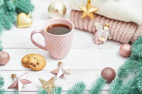 Christmas table setting. Cup of coffee or tea on background of Christmas tree Stock Photos