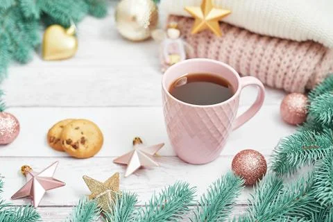 Christmas table setting. Cup of coffee or tea on background of Christmas tree Stock Photos