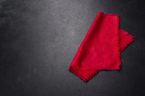 Christmas table setting with empty black ceramic plate, fir tree branch and b Stock Photos