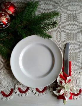 Christmas table setting on a linen tablecloth. Stock Photos