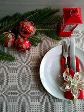 Christmas table setting on a linen tablecloth. Stock Photos
