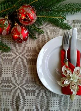 Christmas table setting on a linen tablecloth. Stock Photos