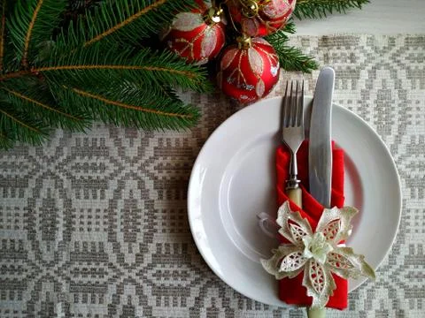 Christmas table setting on a linen tablecloth. Stock Photos