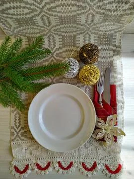 Christmas table setting on a linen tablecloth. Stock Photos