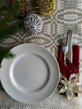 Christmas table setting on a linen tablecloth. Stock Photos