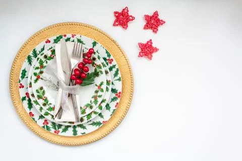 Christmas Table Setting on white background. Top view with copy space Stock Photos