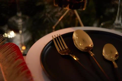 Christmas table. View of gilded table objects. Beautiful picture Stock Photos