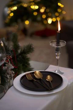 Christmas table. View of gilded table objects. Beautiful picture Stock Photos