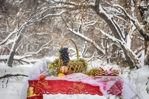 Christmas table in winter forest Stock Photos