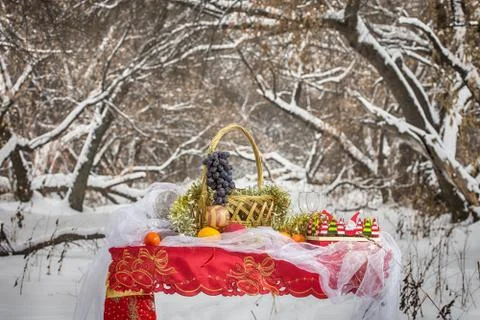 Christmas table in winter forest Stock Photos