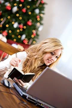 Christmas: Taking Notes On Online Gift Stock Photos