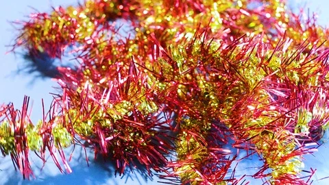 Christmas tinsel is removed from the table. Stock-Footage 97603118