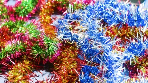 Christmas tinsel is removed from the table. Stock Footage 97603204