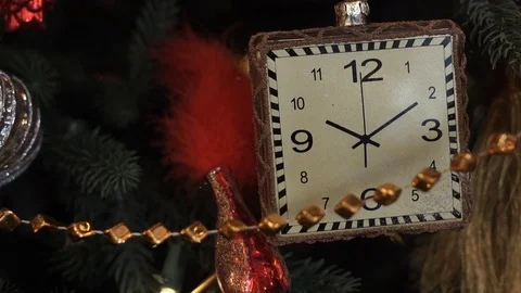 Christmas toy as a clock closeup 库存影片 70793993